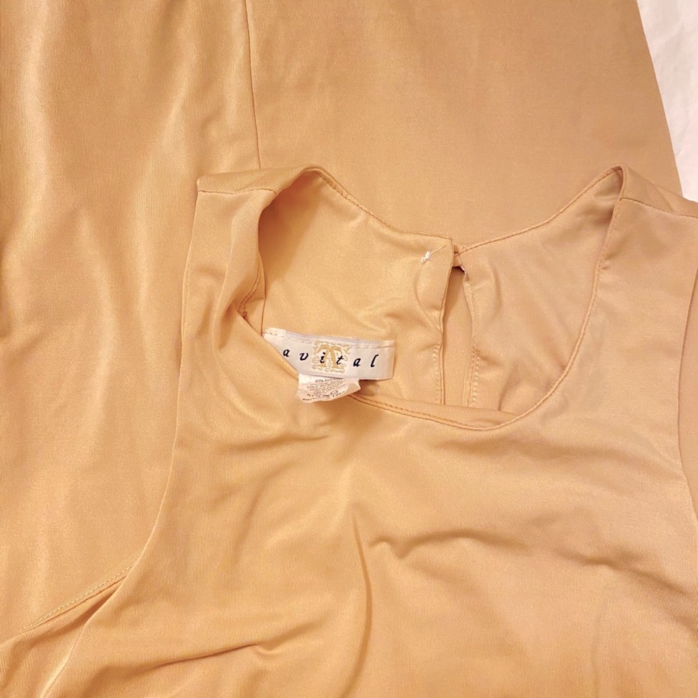 “Avital “brand, nude night wear